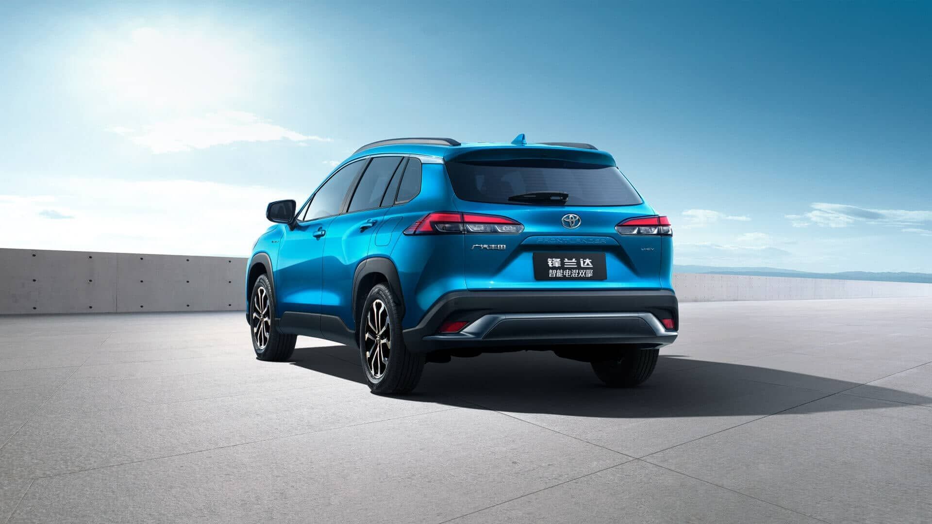 Detail of zipper pull with tan leather and silver rivet.